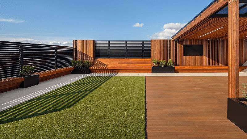 mixed finishes - grass, tile and board on a rooftop