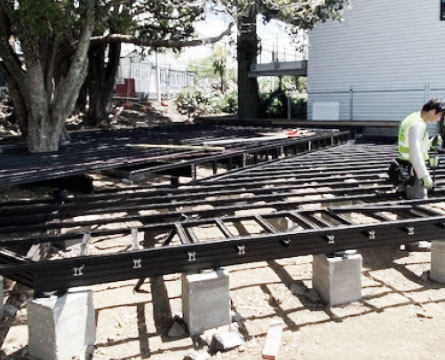 mid height framing around a tree and backyard