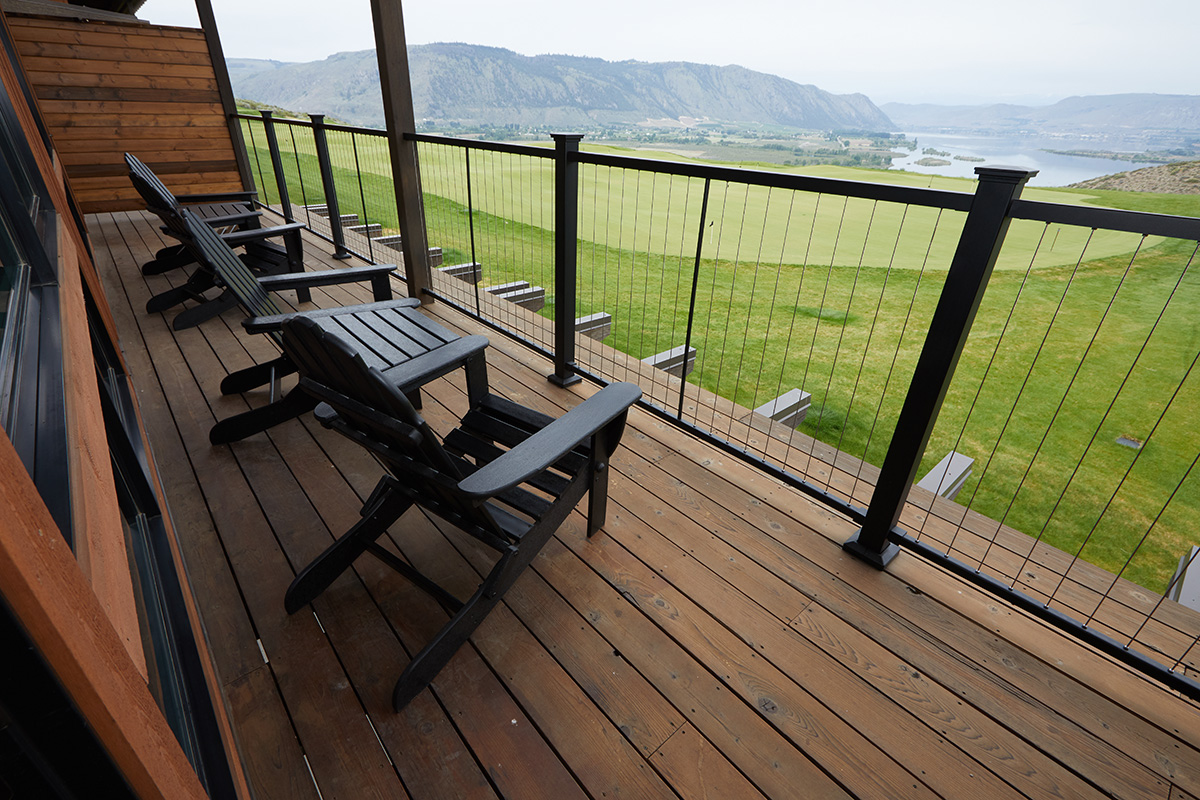 Fortress FE26 series vertical cable railing installed on balcony deck