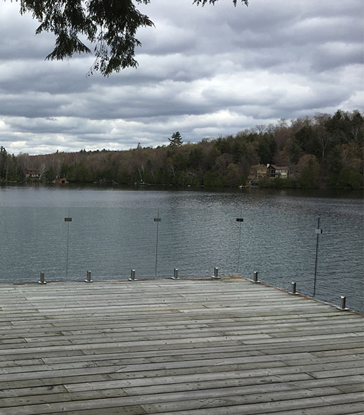 glass railing surrounding a dock