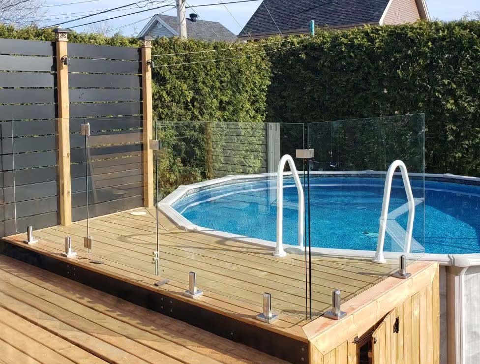 glass panels around a pool
