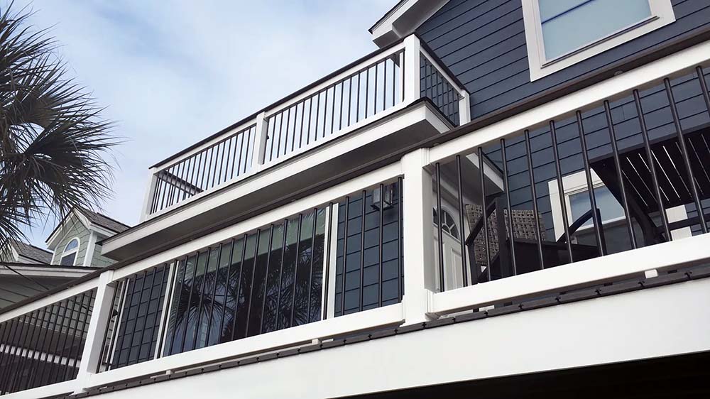 Vinyl railing installed on raised deck